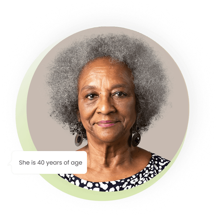 Older woman with grey hair, smiling