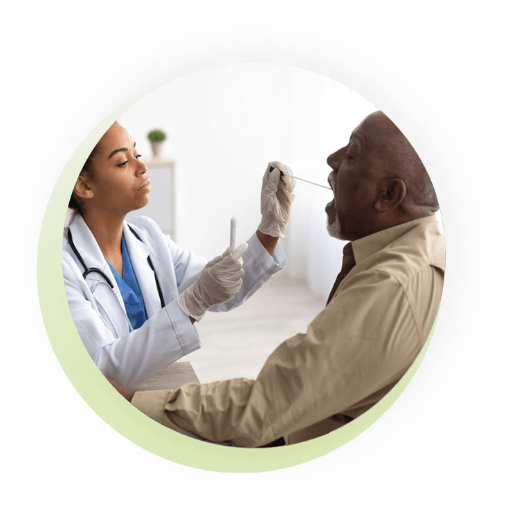 Healthcare professional collecting a DNA saliva sample with a buccal swab